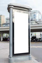 Billboard poster large vertical street. Overpass and crossroads in the background. Mock-up.