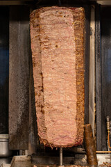 Doner kebab. Turkish doner kebab cooked in wood fire. close up
