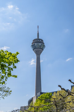 240m-tall Dusseldorf Rheinturm TV tower. Rhine tower (Rheinturm, built 1979 - 1982, architect H. Deilmann) is a striking landmark on Dusseldorf’s Rhine skyline. DUSSELDORF, GERMANY. APRIL 16, 2022.