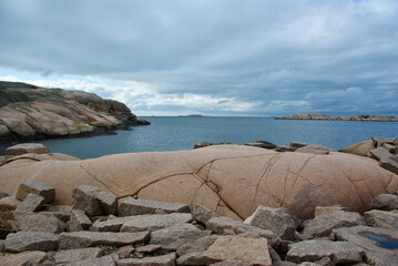Landscape with ocean and red granite boulders on the Swedish west coast.
