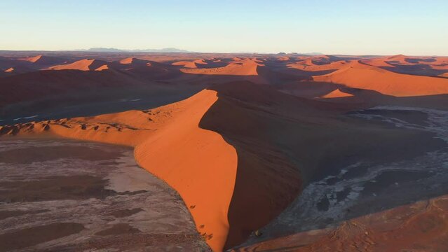 Aerial view of sand dunes at sunset at Namib Desert, Namibia.