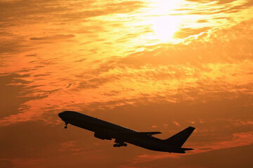 airplane in the sunset