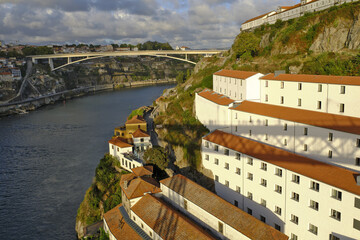 douro river, Ponte Infante Dom Henrique and roof of wine cellars in Vila Nova de Gaia, Portugal	