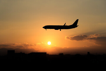 plane in the sunset