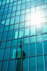 Obraz na płótnie Canvas shanghai skyline reflected in windows of modern office building