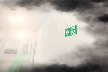Emergency exit and big smoke in the office building