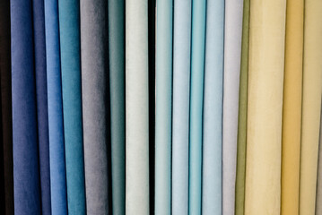 Fototapeta premium Collection of curtains in different colors and patterns. Salon curtains