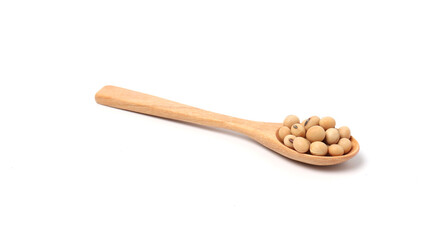 soybeans in wooden spoon isolated on white background