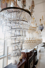 Sale of lamps and chandeliers in the store.Home chandeliers in the store