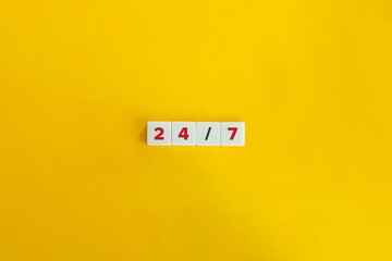 24/7 Banner. Letter Tiles on Yellow Background. Minimal Aesthetics.