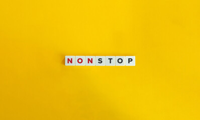 Non Stop Banner. Letter Tiles on Yellow Background. Minimal Aesthetics.