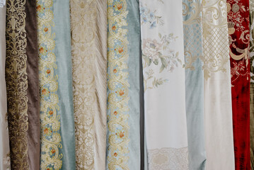 Collection of curtains in different colors and patterns. Salon curtains