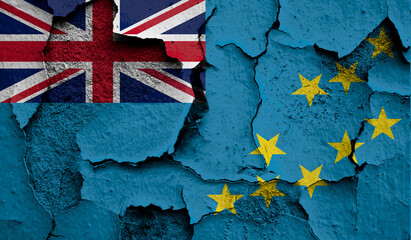 Flag of Tuvalu on old grunge wall in background
