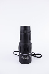 black monocular for observation on a white background