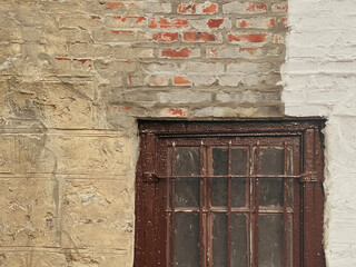 Old wooden window in a wall