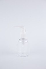 jar container for cream or soap with a dispenser on a white background