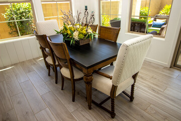Dining Area Wooden Table And Chairs With Centerpiece