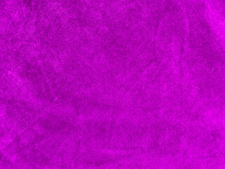 Purple velvet fabric texture used as background. Empty purple fabric background of soft and smooth textile material. There is space for text..