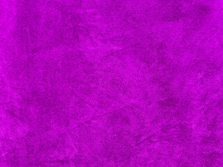 Purple velvet fabric texture used as background. Empty purple fabric background of soft and smooth textile material. There is space for text..