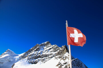 swiss flag on the mountain