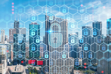 Aerial panoramic city view of Chicago downtown area, day time, Illinois, USA. Birds eye view, skyscrapers, skyline. Concept of cyber security to protect companies confidential information, hologram