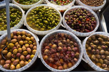 Pickled olives of different varieties at the bazaar.