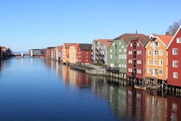 reflection of buildings in the water - Trondheim