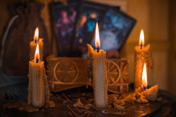 Magical illustration, esoteric concept. Candles for clean your energy, reiki. Gem stones and other...
