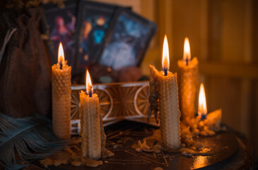 Magical illustration, esoteric concept. Candles for clean your energy, reiki. Gem stones and other...