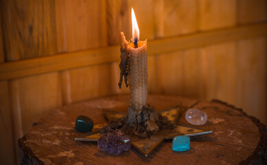 Magical illustration, esoteric concept. Candles for clean your energy, reiki. Gem stones and other...