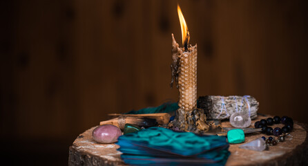 Magical illustration, esoteric concept. Candles for clean your energy, reiki. Gem stones and other...