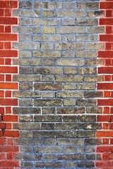 Close up of grey and red bricks