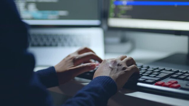 Closeup hand of developer programmer, soffware engineer, IT support, typing on computer keyboard