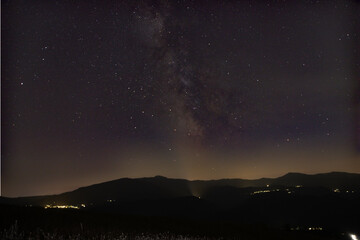 Fototapeta na wymiar Milky Way with starry night sky from the Pietra di Bismantova on the Reggio Apennines.