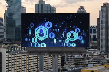 Glowing Social media icons on billboard over sunset panoramic city view of Bangkok. The concept of networking and establishing new connections between people and businesses in Southeast Asia