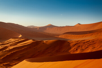 Red and orange sand dunes in Namibia