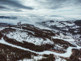Dolni morava, stezka v oblacich - Panoramatic view of winter mountains with clouds inversion