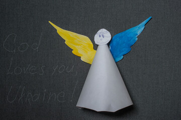 This is a postcard with the guardian angel of Ukraine.