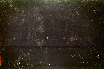 Dark scratched grunge film background