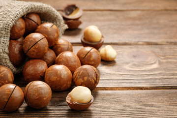 Macadamia nuts on a wooden table.