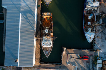 Aerial View top down of a commercial fishing vessel docked in Hampton Virginia