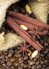 Coffee on the roasted coffee beans background