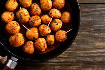 Bombay potatoes in frying pan