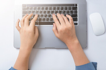 Fototapeta na wymiar person typing on a laptop computer