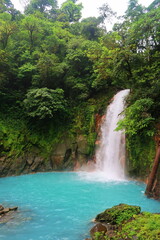 La Fortuna, Costa Rica, Majestic blue waterfall Rio Celeste in Rio Celeste national park