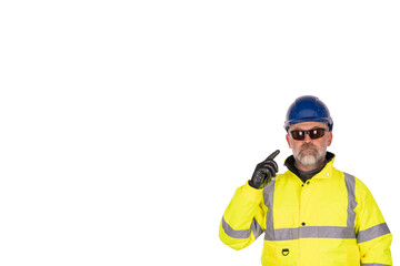 A construction worker in a bright yellow hi-viz coat and safety gloves wearing tinted safety glasses for eye protection isolated on white background. Safety on construction site banner concept
