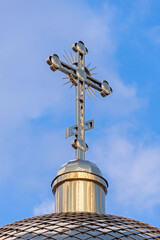 Fototapeta na wymiar a cross on top of a Christian church