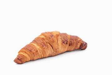 Freshly baked croissant on a light background