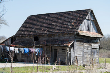 Fototapeta na wymiar Croatia, April 20,2022 : Very old traditional wooden house.