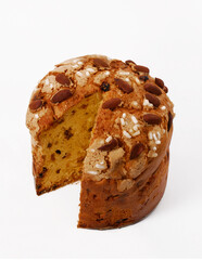 Sliced fresh panettone isolated on white background.